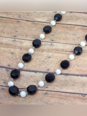 Black and white glass bead necklace with large black oval beads New
